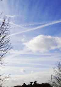 vapour trails criss-crossing the sky